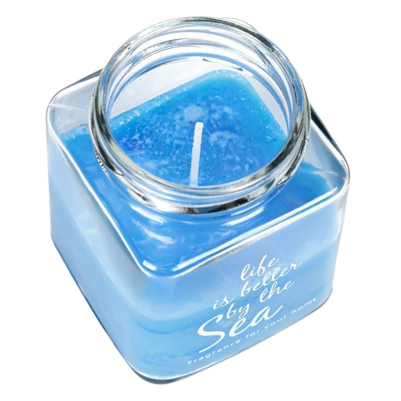 Casa si Gradina - Decoratiuni - Aromaterapie si lumanari - Lumanari si candele - Lumanare parfumata albastra in borcan de sticla cu capac din pluta, 6x6x9.5 cm - Infinity.ro