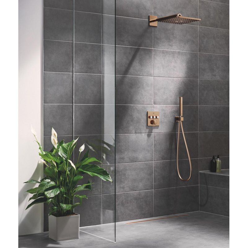 Casa si Gradina - Sanitare - Cazi si cabine de dus - Coloane si seturi de dus - Cot iesire Grohe 26370DA0, Euphoria Cube, 1/2'' x 1/2'', suport para, lucios, cupru - Infinity.ro