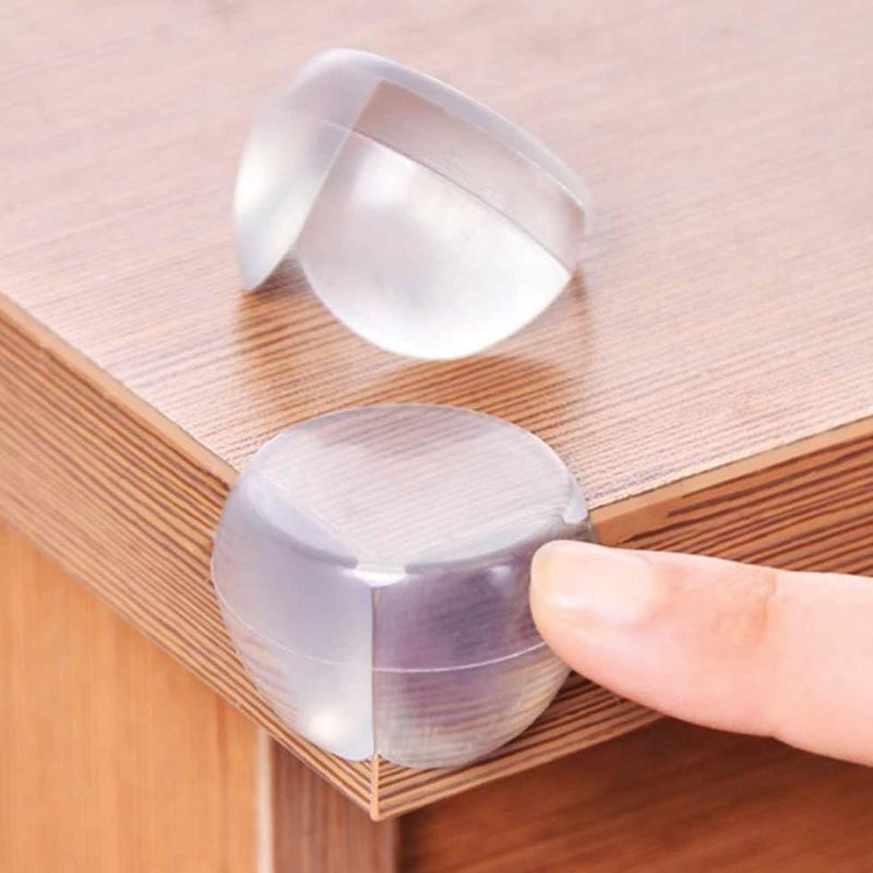 Casa si Gradina - Mobilier - Mobilier copii - Sisteme de siguranta - Set 4 buc protectie colturi masa, plastic transparent, 25x35mm - Infinity.ro