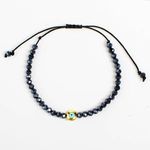 Fashion, accesorii si bijuterii - Femei - Bijuterii femei - Bratari femei - Bratara cu Margele Negre si Ochi Auriu, Reglabila - Infinity.ro