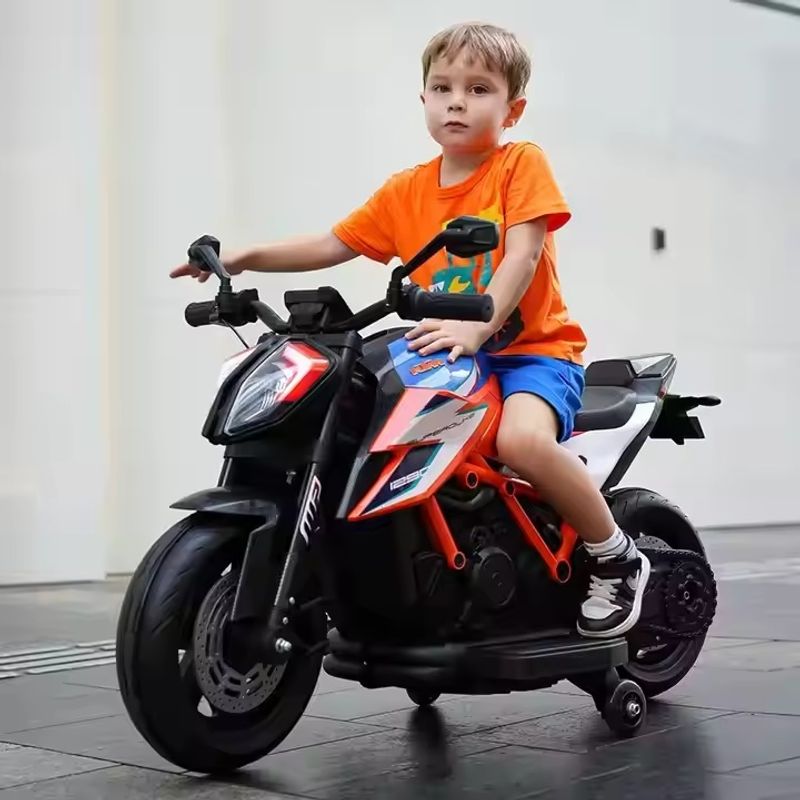 Jucarii, Copii si Bebe - Jucarii si jocuri - Jucarii de exterior - Masinute si vehicule pentru copii - Motocicleta electrica pentru copii 3 ani+, Motor 50W, Baterie 12V7AH, cu roti ajutatoare, lumini si muzica, Portocaliu - Infinity.ro