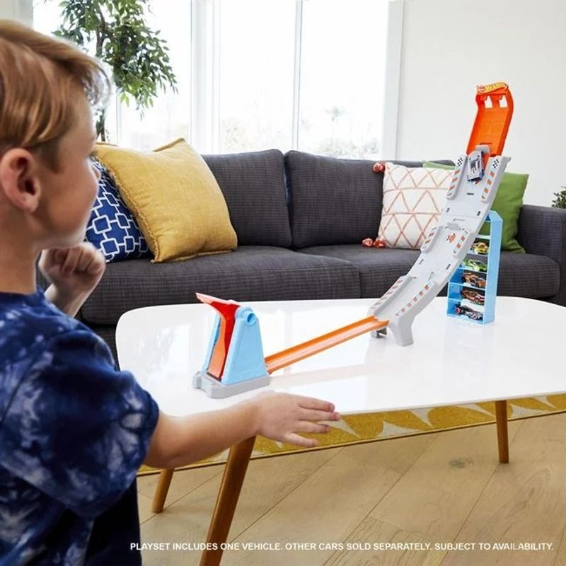 Jucarii, Copii si Bebe - Jucarii si jocuri - Jucarii & jocuri educative - Jucarii interactive - Pista de curse Hot Wheels, include lansatoare si o masina Hot Wheels - Infinity.ro