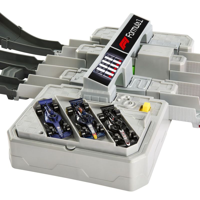 Jucarii, Copii si Bebe - Jucarii si jocuri - Vehicule si jucarii cu telecomanda - Masinute - HOT WHEELS RACING CIRCUIT DE CURSE GRAND PRIX FORMULA 1 CU 3 MASINUTE INCLUSE - Infinity.ro