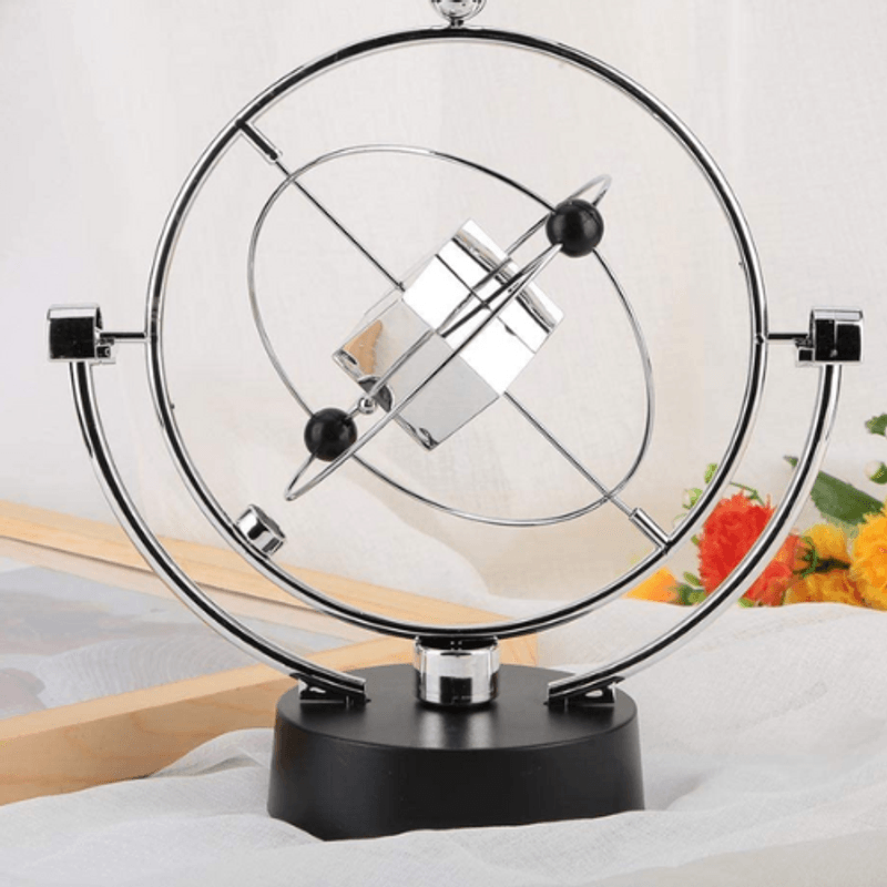 Casa si Gradina - Decoratiuni - Obiecte decorative - Accesorii decorative - Decoratiune Perpetuum Mobile SpectrumPoint®, orbital cu miscare perpetua, plastic si metal, 24 x 24 x 10 cm - Infinity.ro